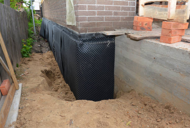 SJ Waterproofing Pros technician performing targeted Waterproofing assessment in Oradell, NJ